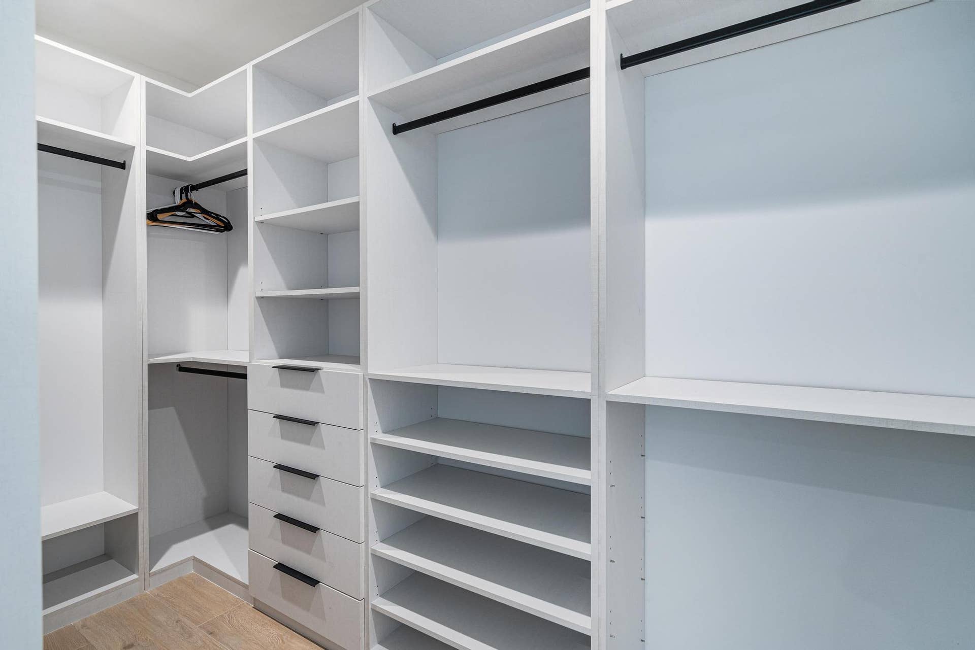 Custom closets throughout the home offering tailored storage and refined organization.