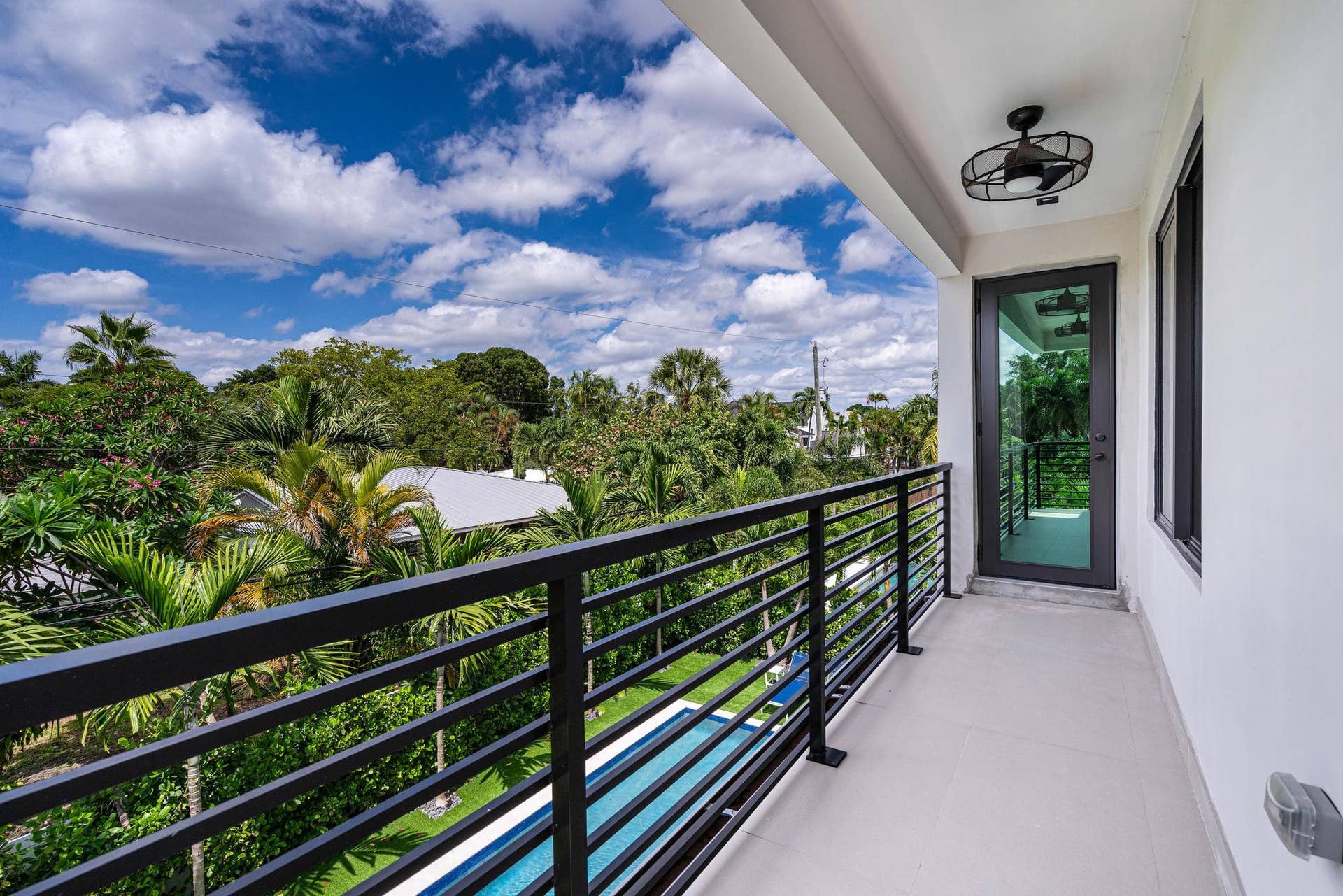 Private primary suite balcony offering serene, elevated outdoor retreat.