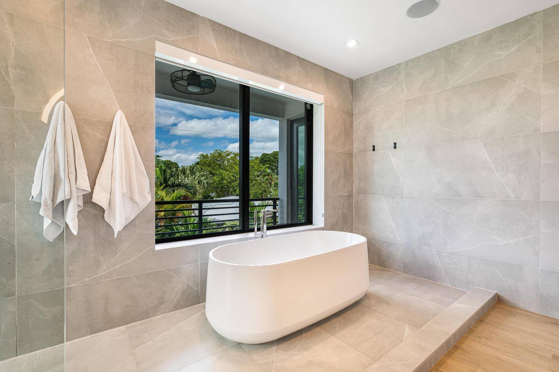 Soaking tub with a serene, expansive view for ultimate relaxation.