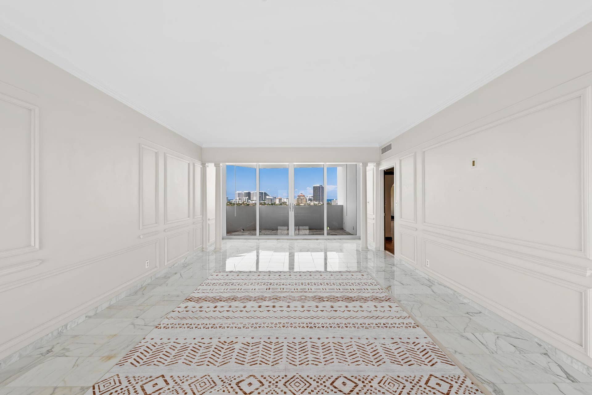 View of iiving room to patio and 2nd master suite on the side