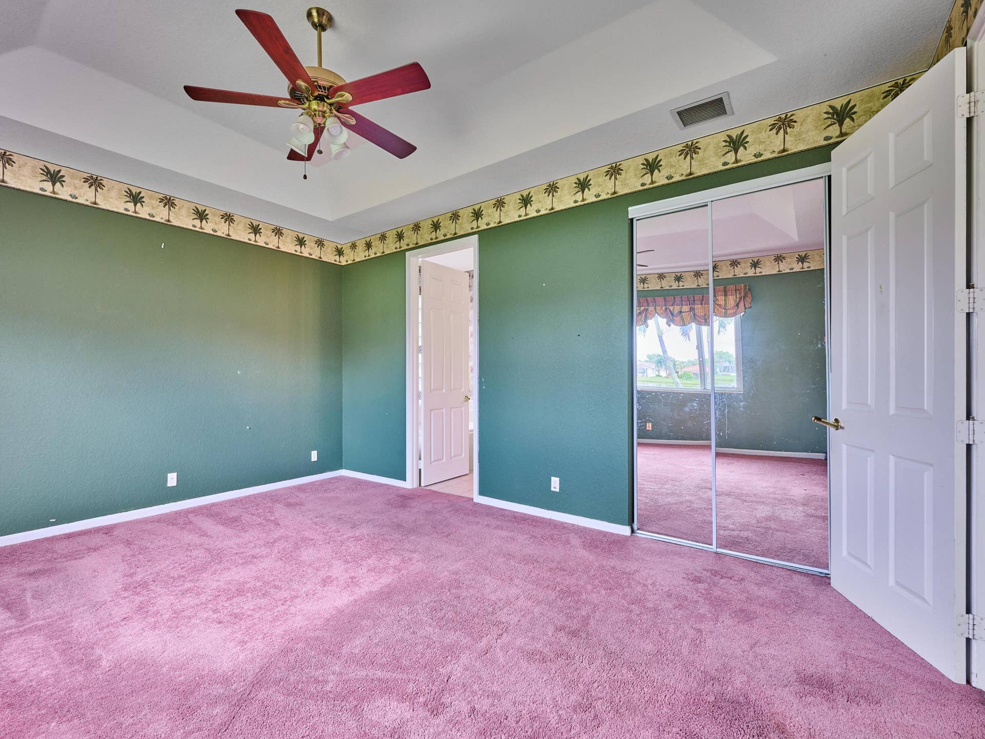 2649 Clipper Circle, West Palm Beach, FL 33411 Walk in Closet with mirrored doors.