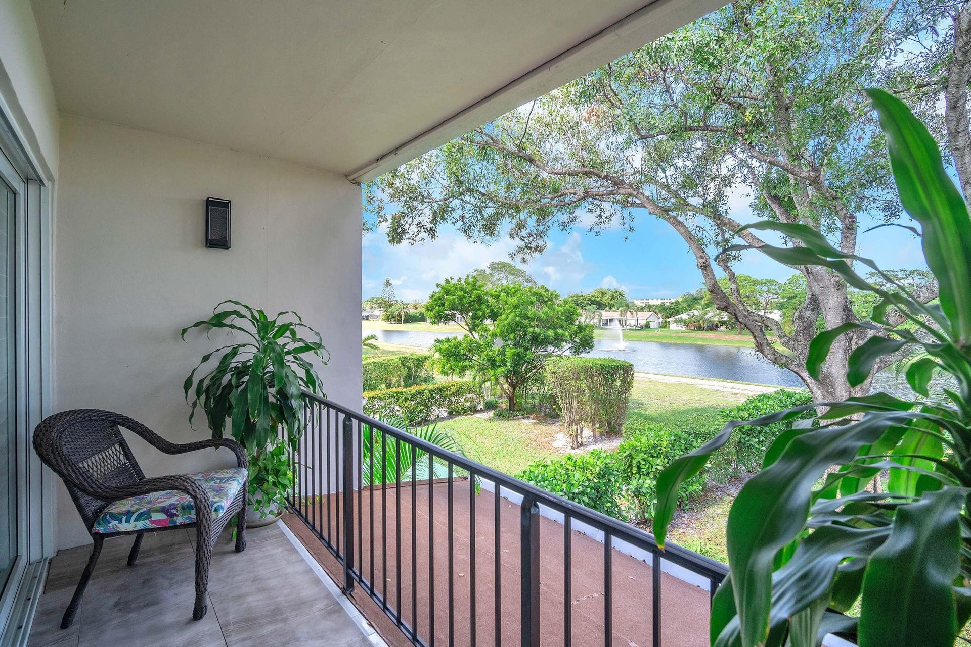 3073 N Palm Aire Drive, #3073, Pompano Beach, FL 33069 Lake & Fountain Views from the Primary Bedroom's Private Balcony