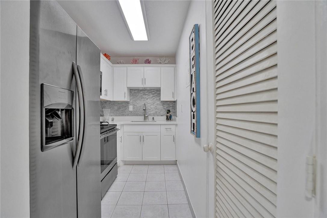 Beautifully Updated kitchen with full size Closet Pantry.