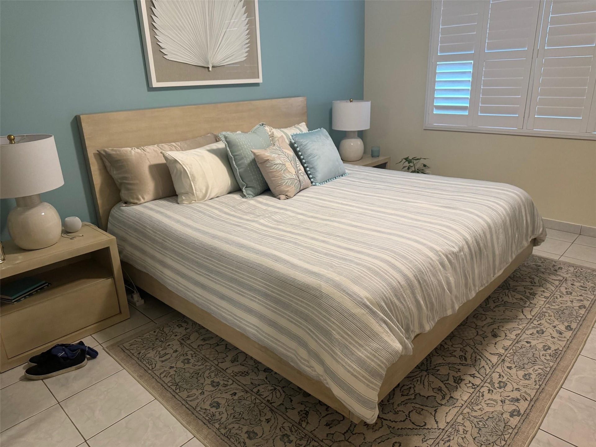 The king-size Pottery Barn bed and matching nightstands may remain with the condo rental or can be removed upon request.