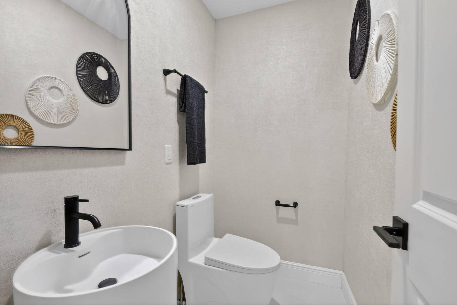 308 Greymon Drive, West Palm Beach, FL 33405 Ground floor half bath off the kitchen