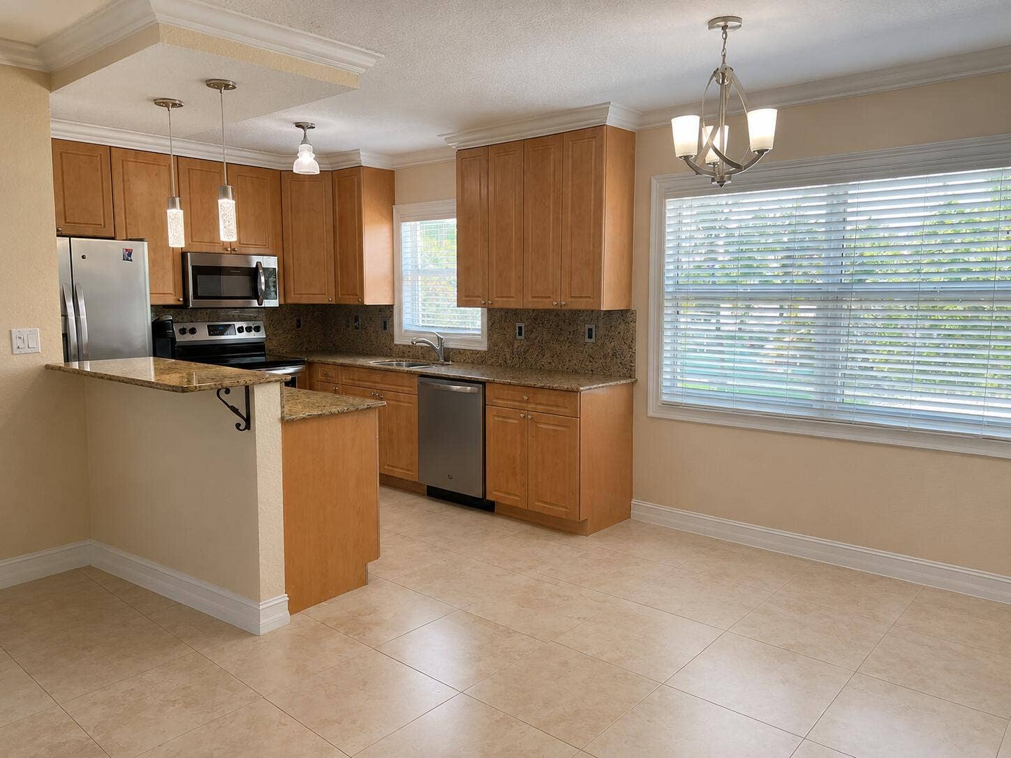 Kitchen opens to the dining area.