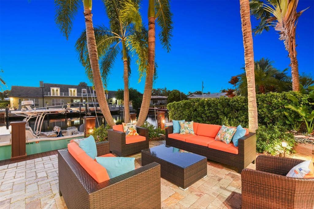 4431 NE 24th Avenue, Lighthouse Point, FL 33064 Backyard lounge area