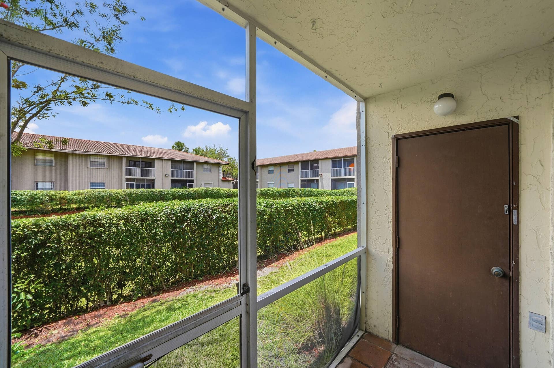 8840 Royal Palm Boulevard, #105-7, Coral Springs, FL 33065 Screened in Patio