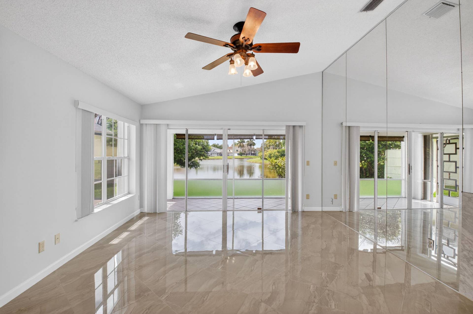 6413 Lansdowne Circle, Boynton Beach, FL 33472 Living Room Lake View