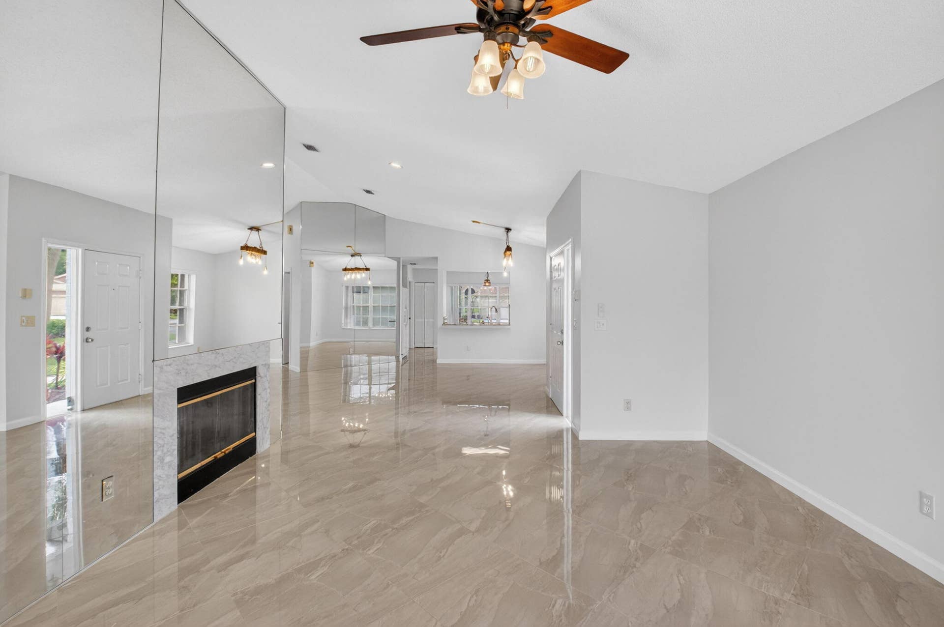 6413 Lansdowne Circle, Boynton Beach, FL 33472 Living room view to dining room