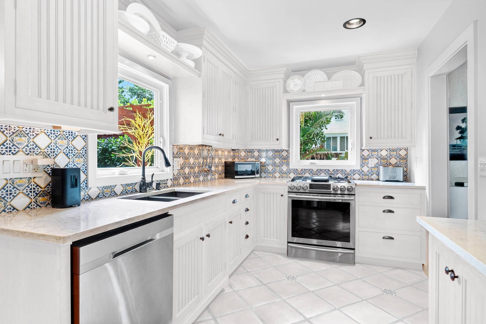 348 Plymouth Road, West Palm Beach, FL 33405 virtually painted white