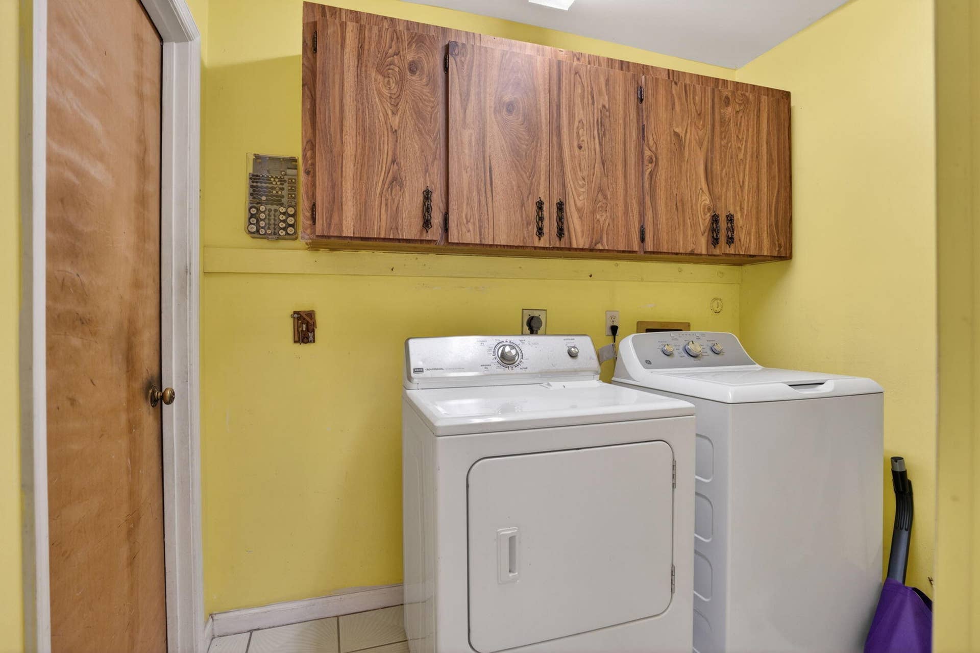 16735 Alexander Run, Jupiter, FL 33478 Laundry room leading to garage.