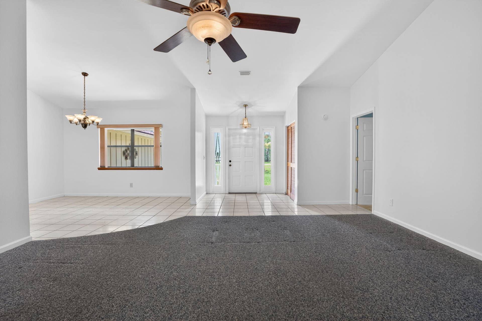 16735 Alexander Run, Jupiter, FL 33478 View from living room into entry way and dining room.