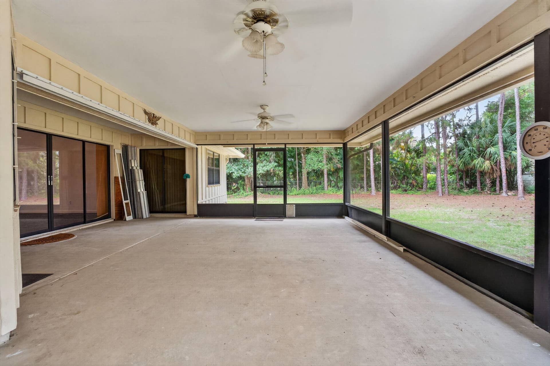 16735 Alexander Run, Jupiter, FL 33478 Screened-in porch with access to main suite, living room and kitchen.