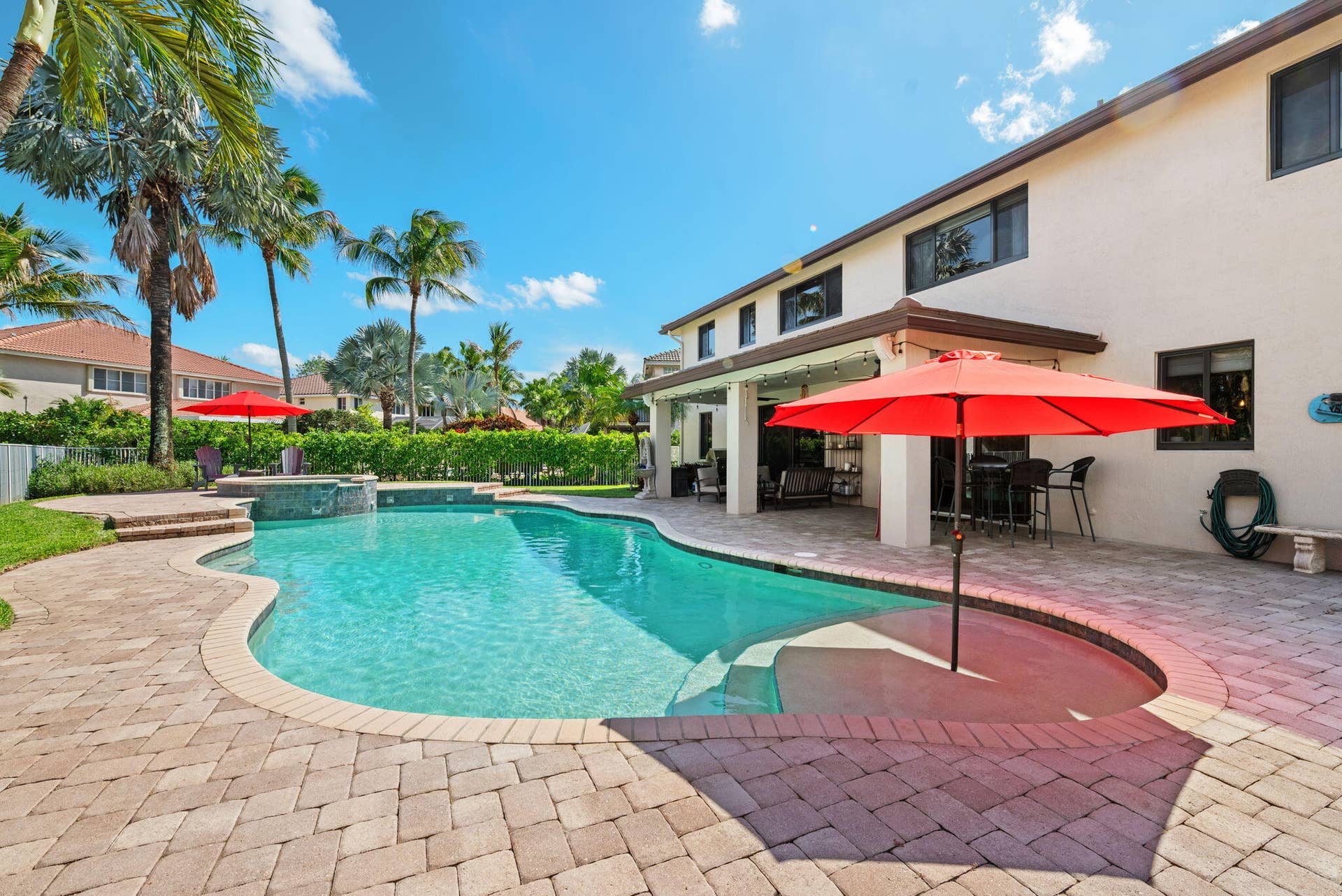 The shallow (6"-8") platform entry with built-in sunbrella is a great spot to splash in the cool water with the little ones