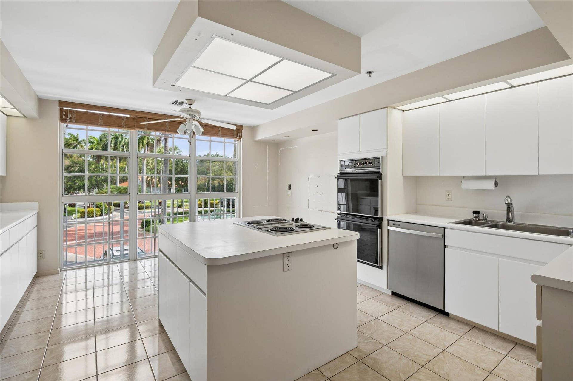 09-Cowan_Bounahra-4112 W Palm Aire Dr #1