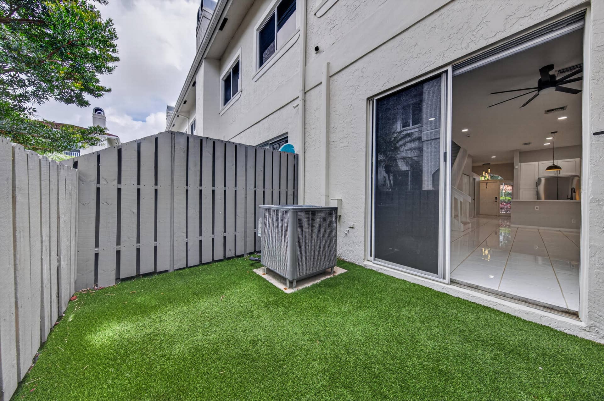 835 NE 17th Way, Fort Lauderdale, FL 33304 Outdoor area with artificial turf