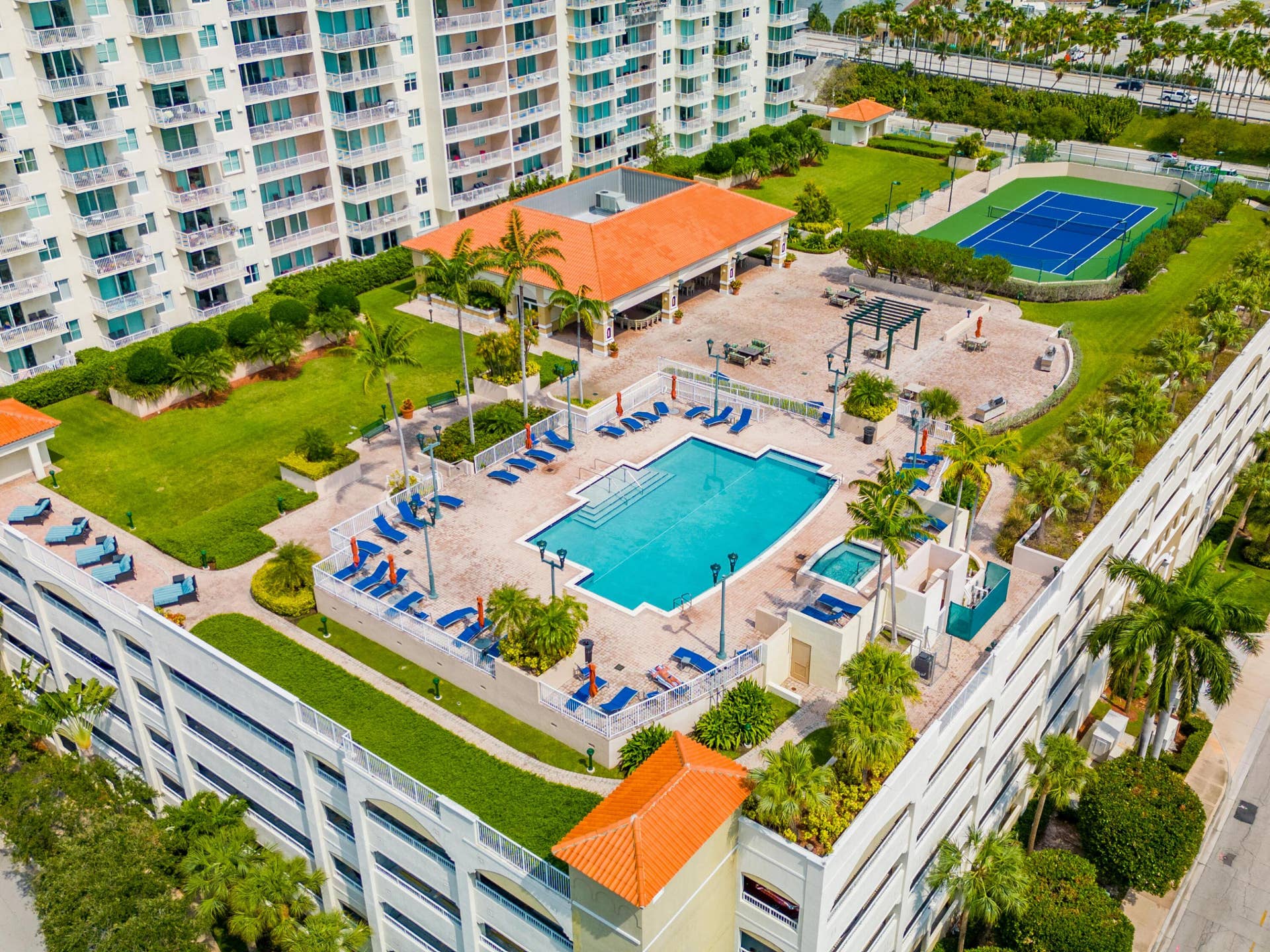 3020 NE 32nd Avenue, #710, Fort Lauderdale, FL 33311 Amenity Deck - Pool, Tennis Court and Gardens.