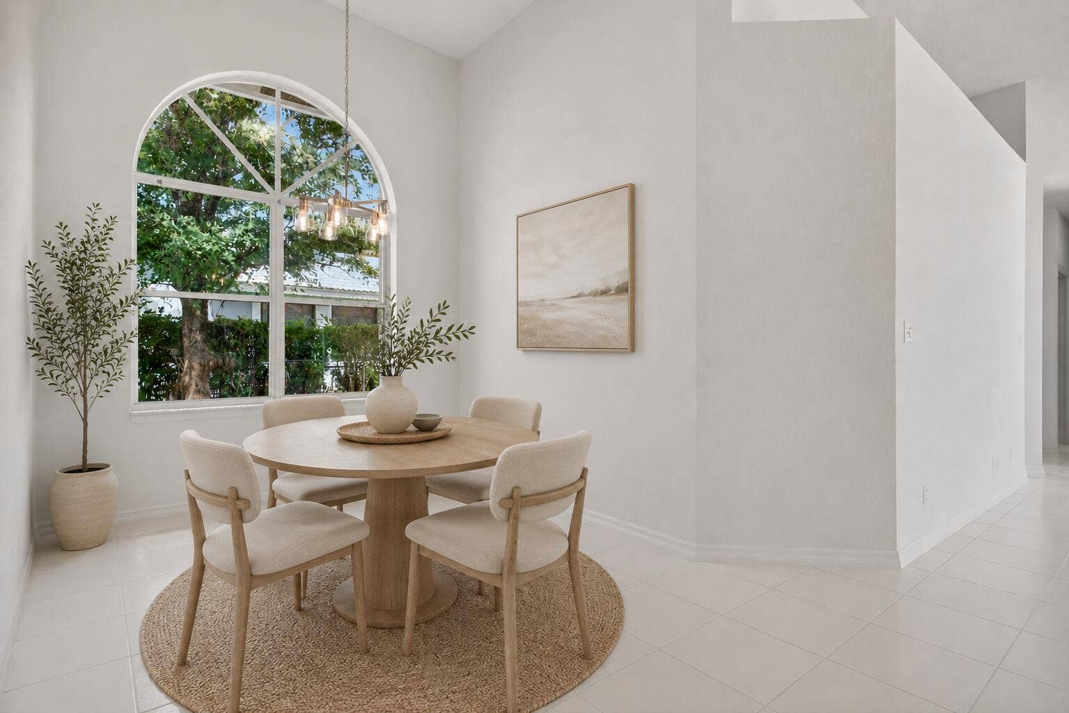 Breakfast nook area with beautiful natural lighting! (Virtually Staged image)