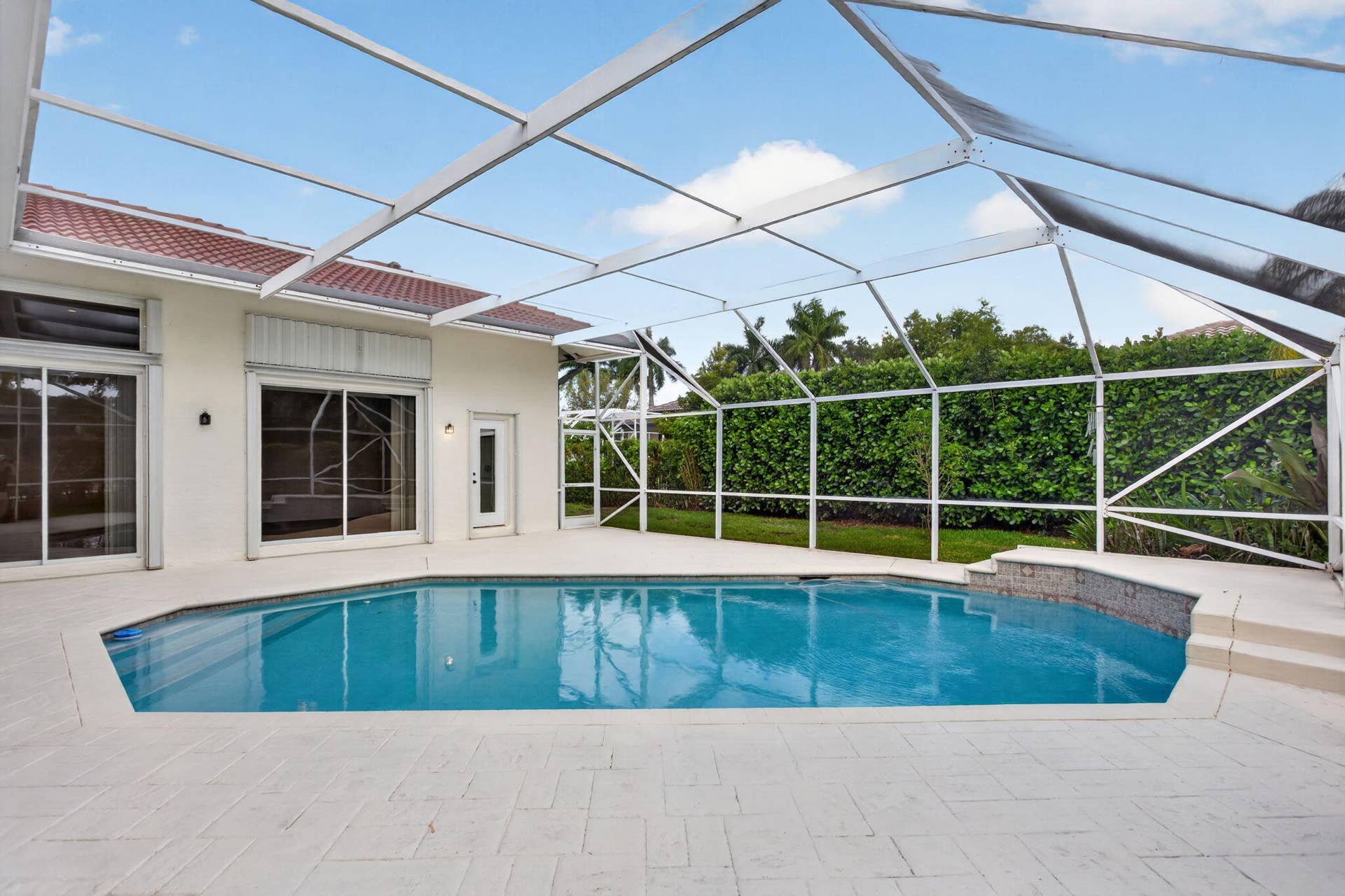 Screened in pool with large patio space!