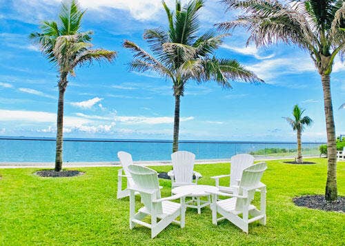 5070 N Ocean Drive, #23c, Riviera Beach, Singer Island, FL 33404 chairs by south pool