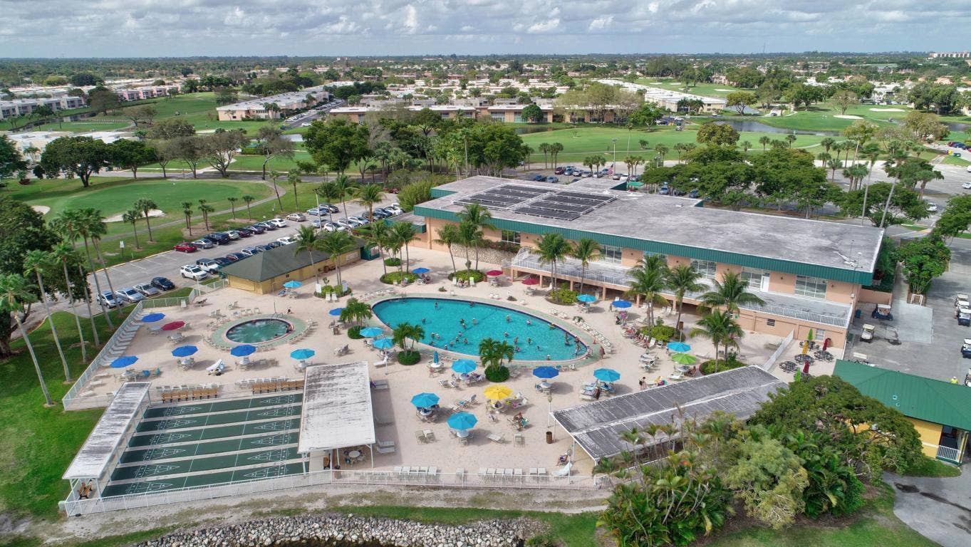 129 Piedmont C, Delray Beach, FL 33484 aerial pool
