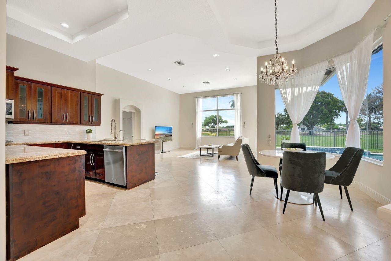 2491 Eagle Run Drive, Weston, FL 33327 Light bright and airy, with saturnia marble flooring throughout and in immaculate condition.
