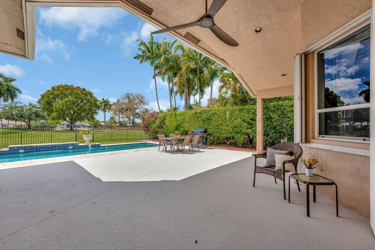 2491 Eagle Run Drive, Weston, FL 33327 Enjoy the outdoors in the shade of the covered patio; brand new BBQ grill too!
