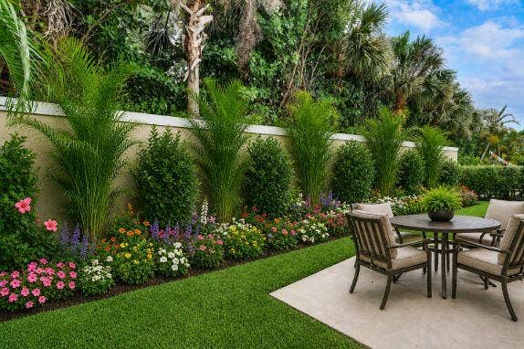 Back open patio - virtually staged and with greenery