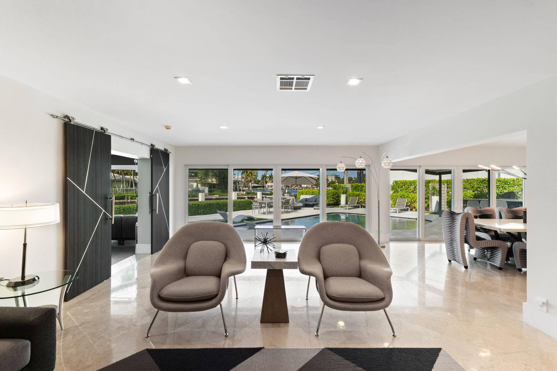3321 NE 59th Street, Fort Lauderdale, FL 33308 living room looking at pool