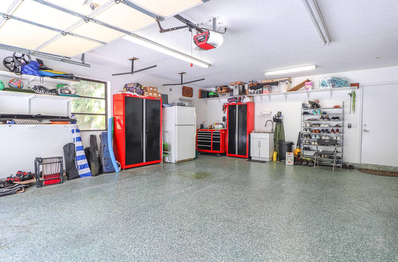 8259 155th Place N, Palm Beach Gardens, FL 33418 56-Attached garage