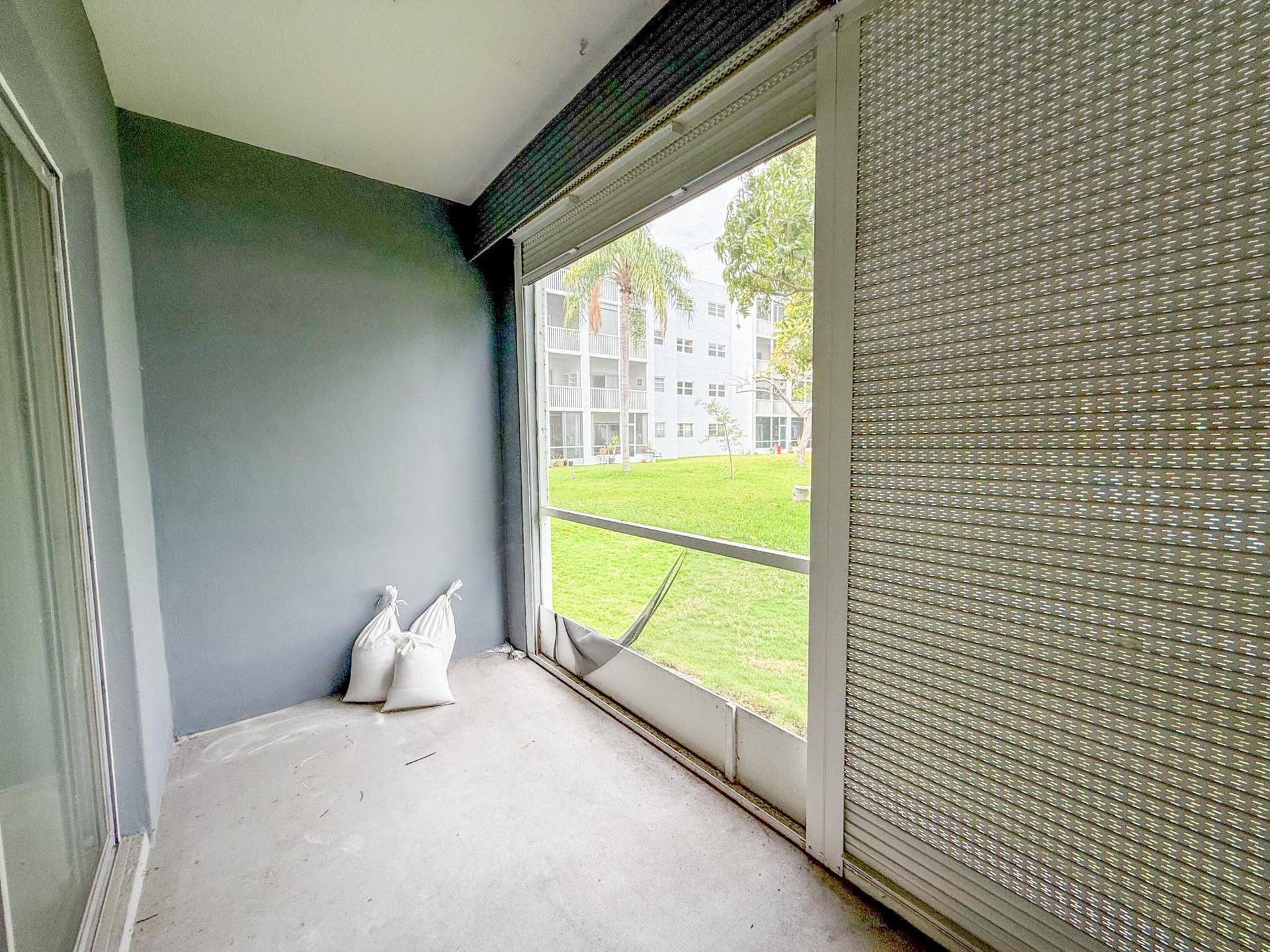 604 NE 2nd Street, #122, Dania Beach, FL 33004 Screened in Patio with lake view