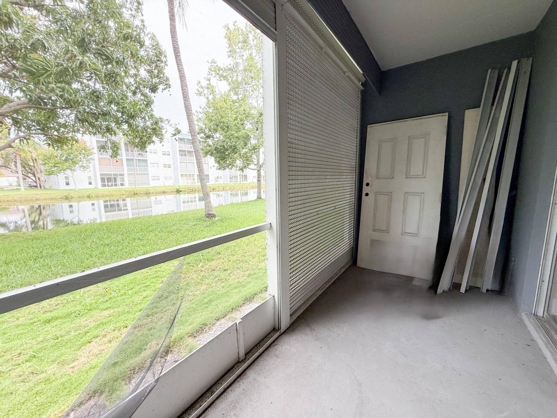 604 NE 2nd Street, #122, Dania Beach, FL 33004 Screened in Patio with lake view