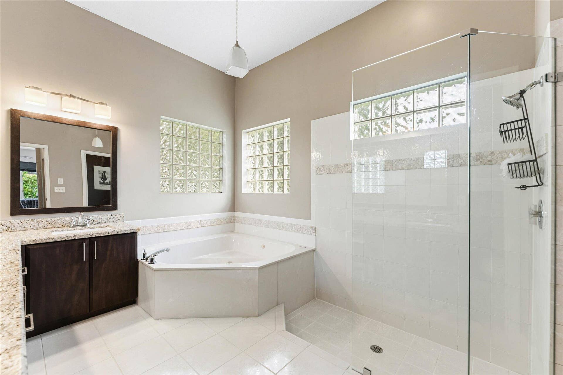 Primary bathroom with tub and standalone shower!