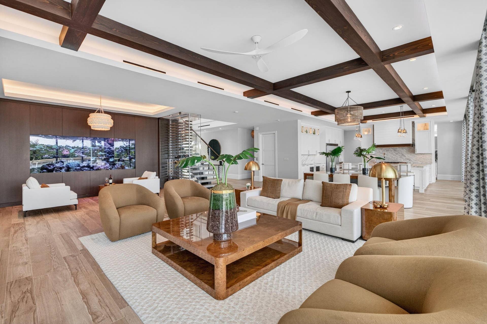 1900 Intracoastal Drive, Fort Lauderdale, FL 33305 The living room incorporates a live aquarium, glass wine wall and tasting area. Entertaining flows effortlessly throughout this home.