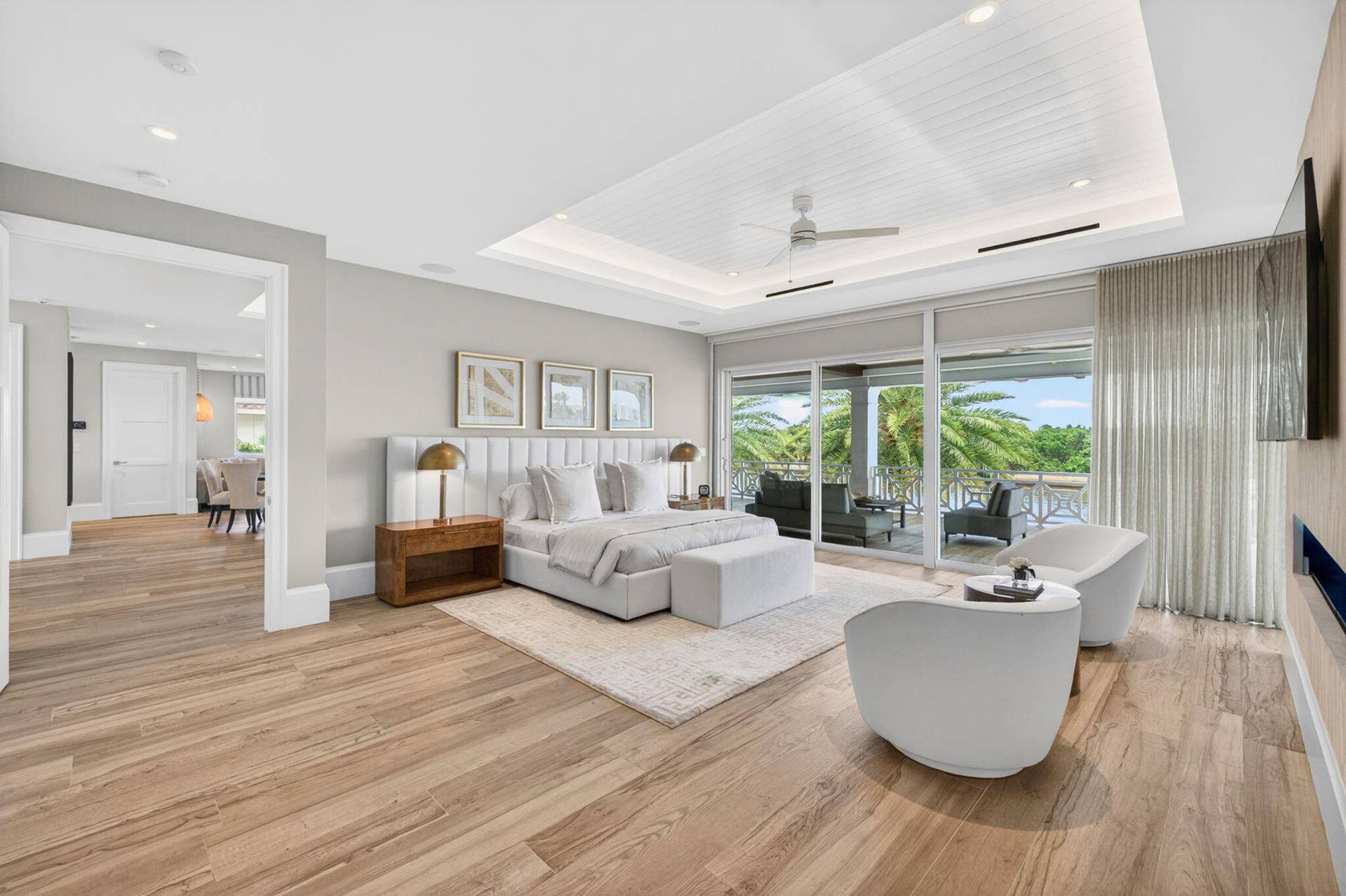 Extraordinary primary suite includes fireplace & spa style bath, seperate closets, office, and adjoining gym with sauna/en-suite bath plus private balcony.