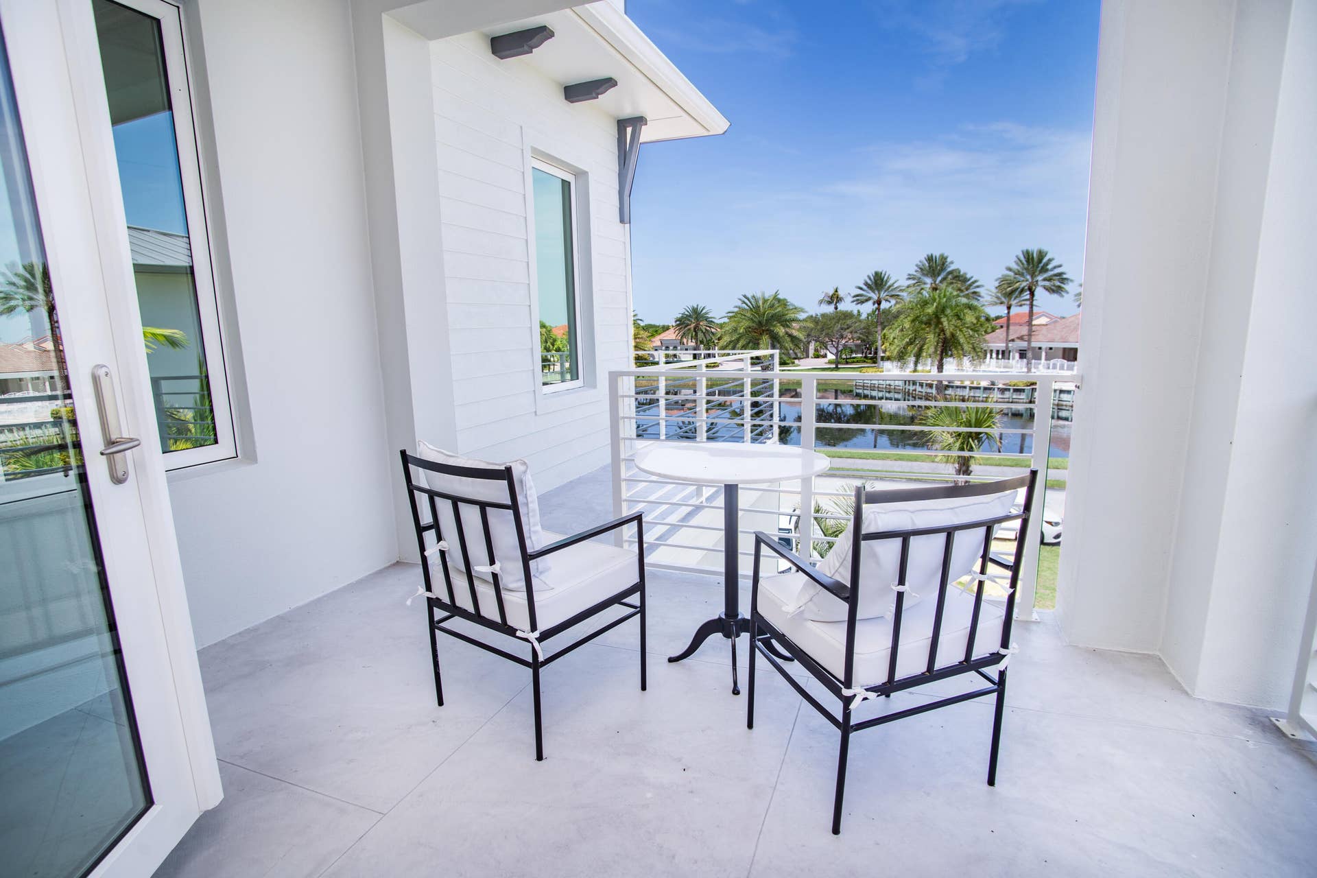 4842 S Harbor Drive, Vero Beach, FL 32967 Private second-floor covered balcony: the ultimate vantage point for tranquil morning coffees and stunning evening sunsets.