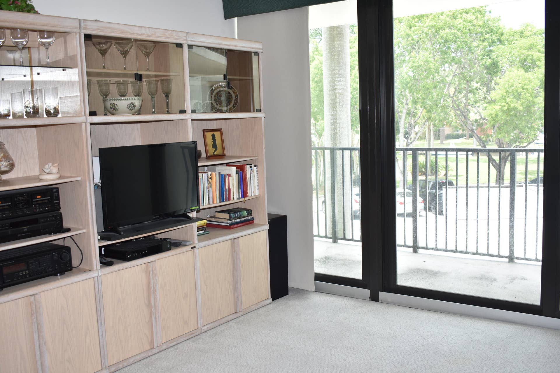 1101 River Reach Drive, #212, Fort Lauderdale, FL 33315 Living room with new impact sliding glass doors to balcony
