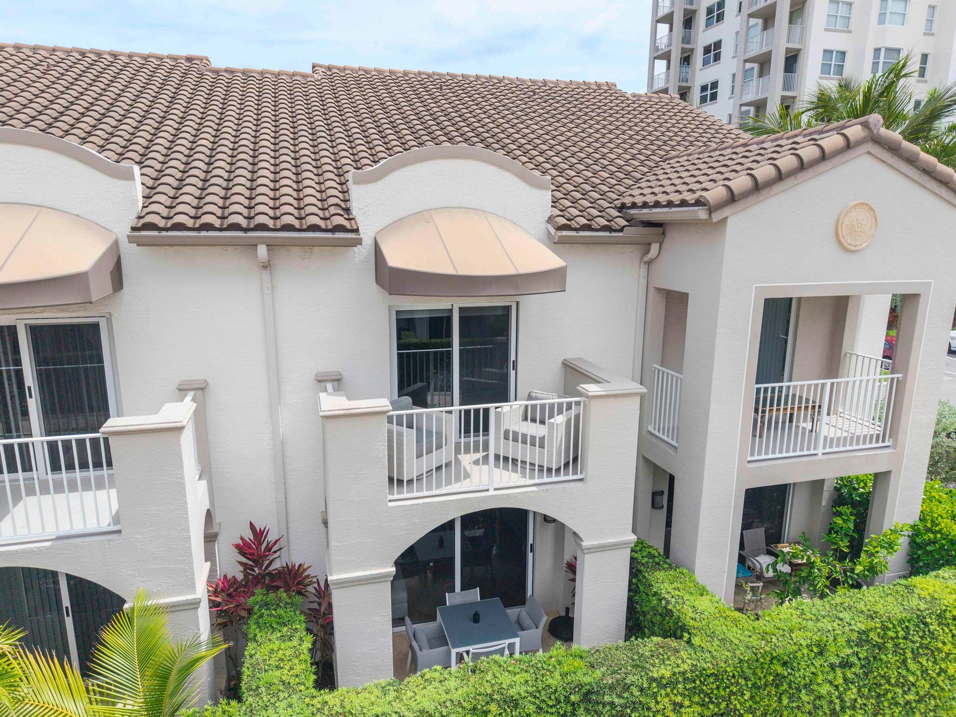 Balcony from Primary bedroom and downstairs patio