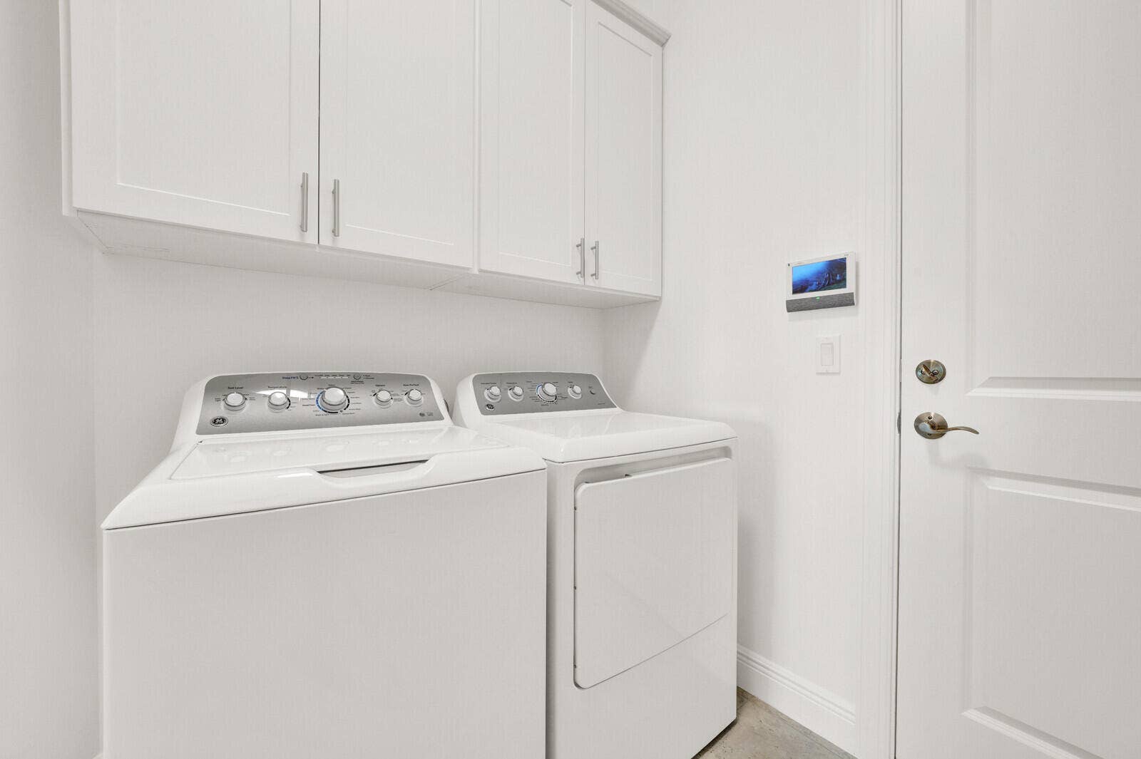 White cabinetry with brushed nickel hardware
