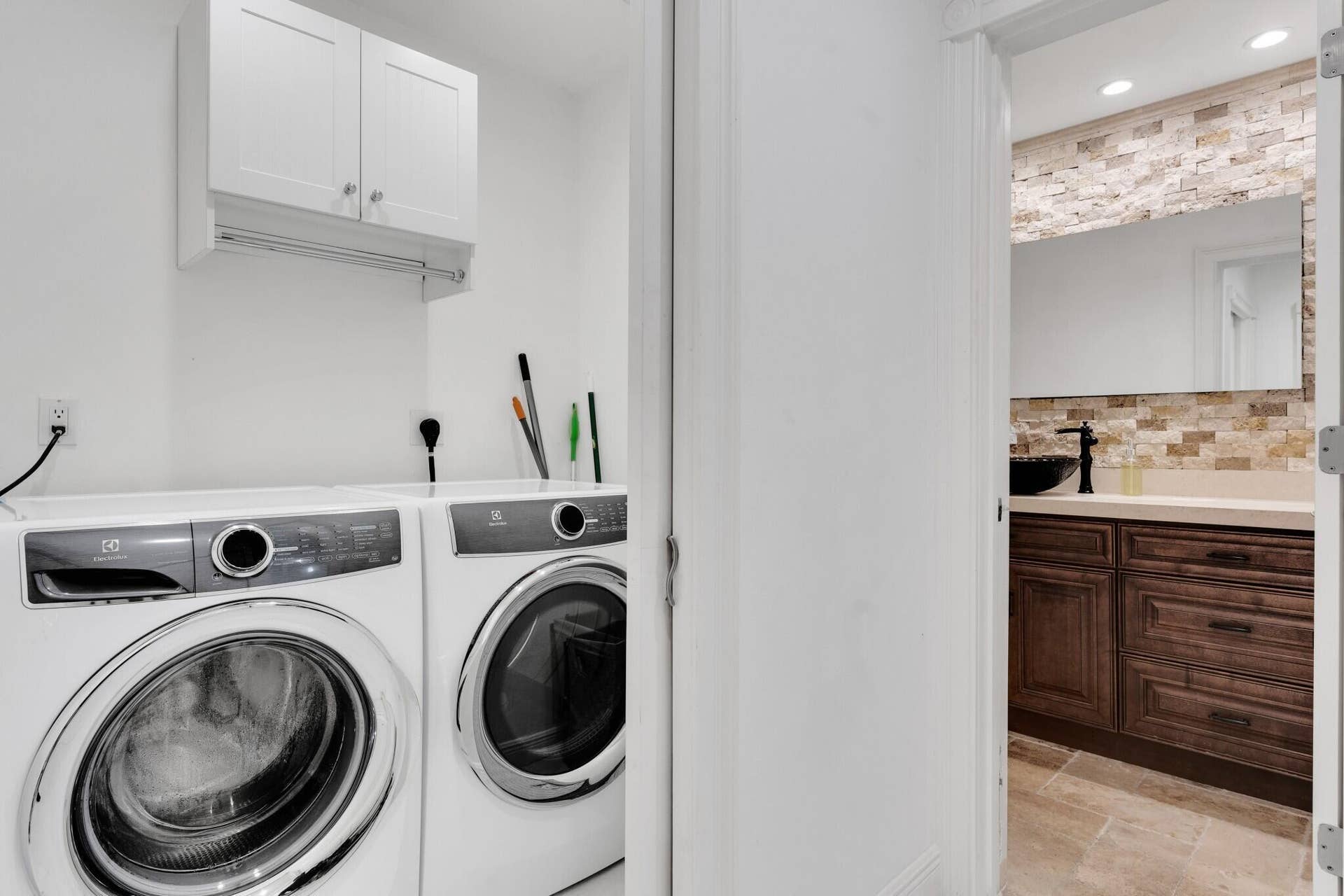 Separate Laundry room on 1st floor adjacent to 1/2 bath