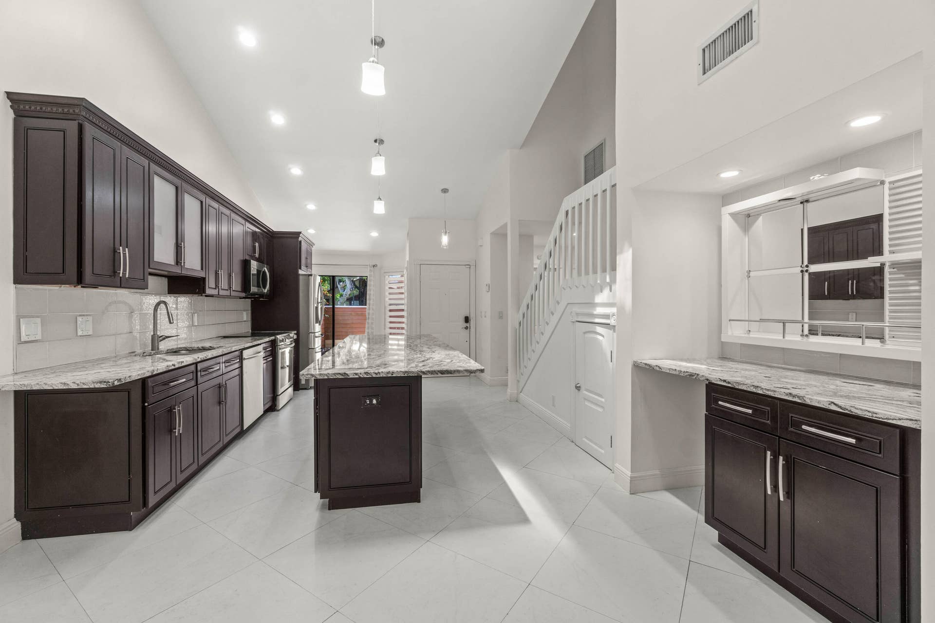 Spacious Kitchen Island ~ Plenty of space to have guests join you while sipping beverages.