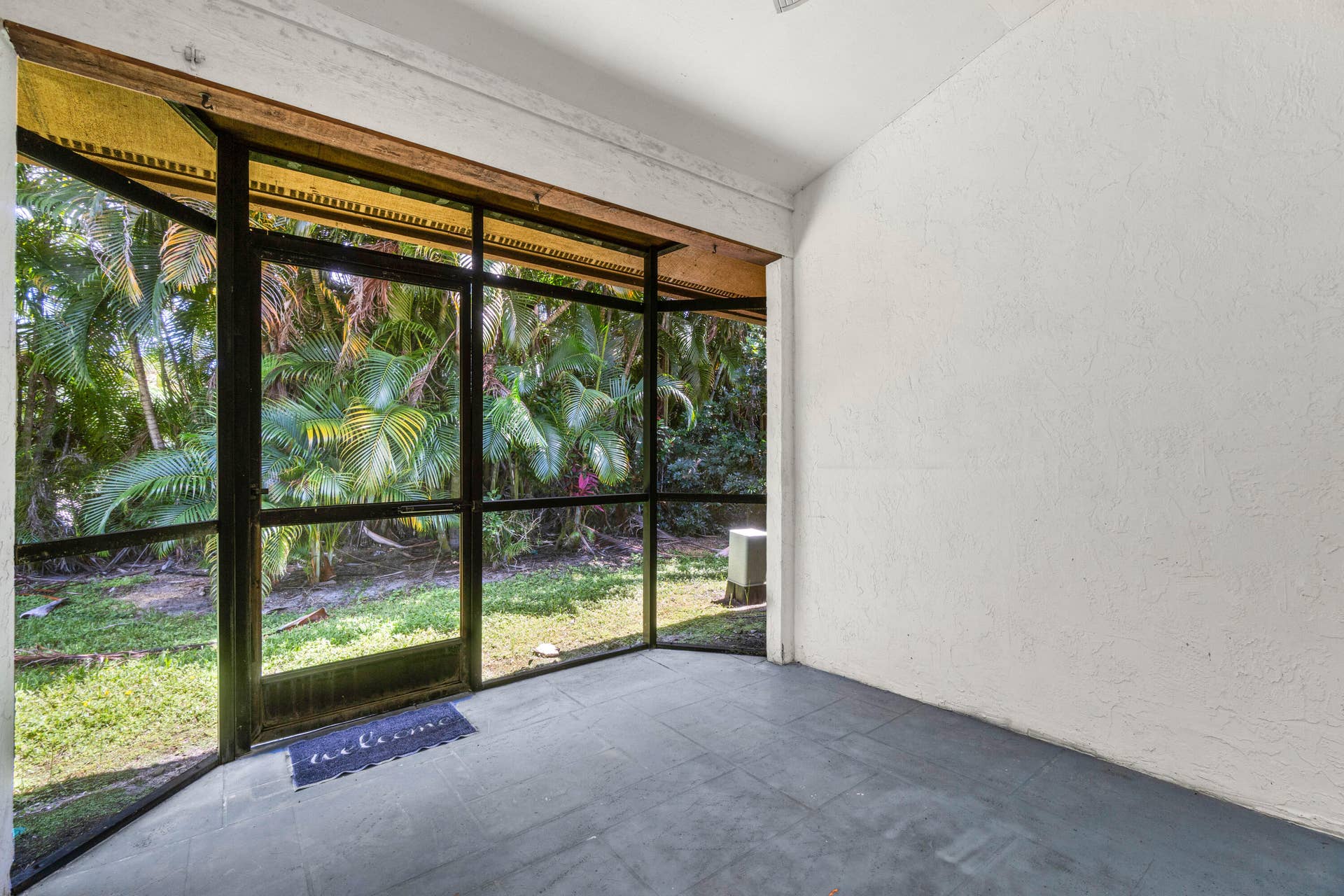 Peaceful view from your Screened Patio in rear of home