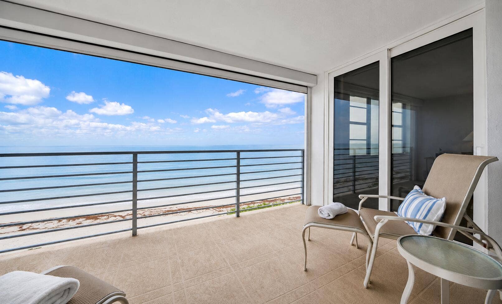 900 Ocean Drive, #202, Juno Beach, FL 33408 2nd floor residence. Hurricane rated sliding glass doors & electric hurricane shade