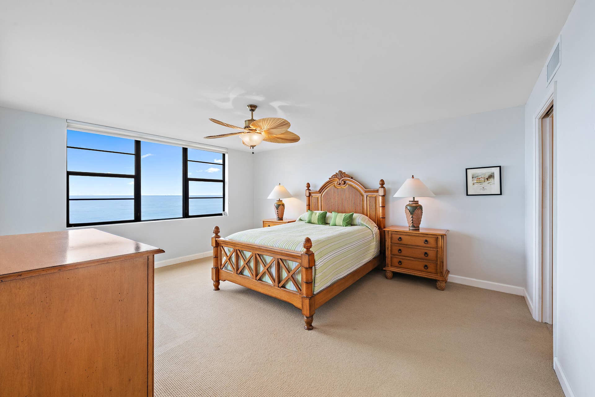 900 Ocean Drive, #202, Juno Beach, FL 33408 Primary bedroom with incredible views, hurricane windows & sliders