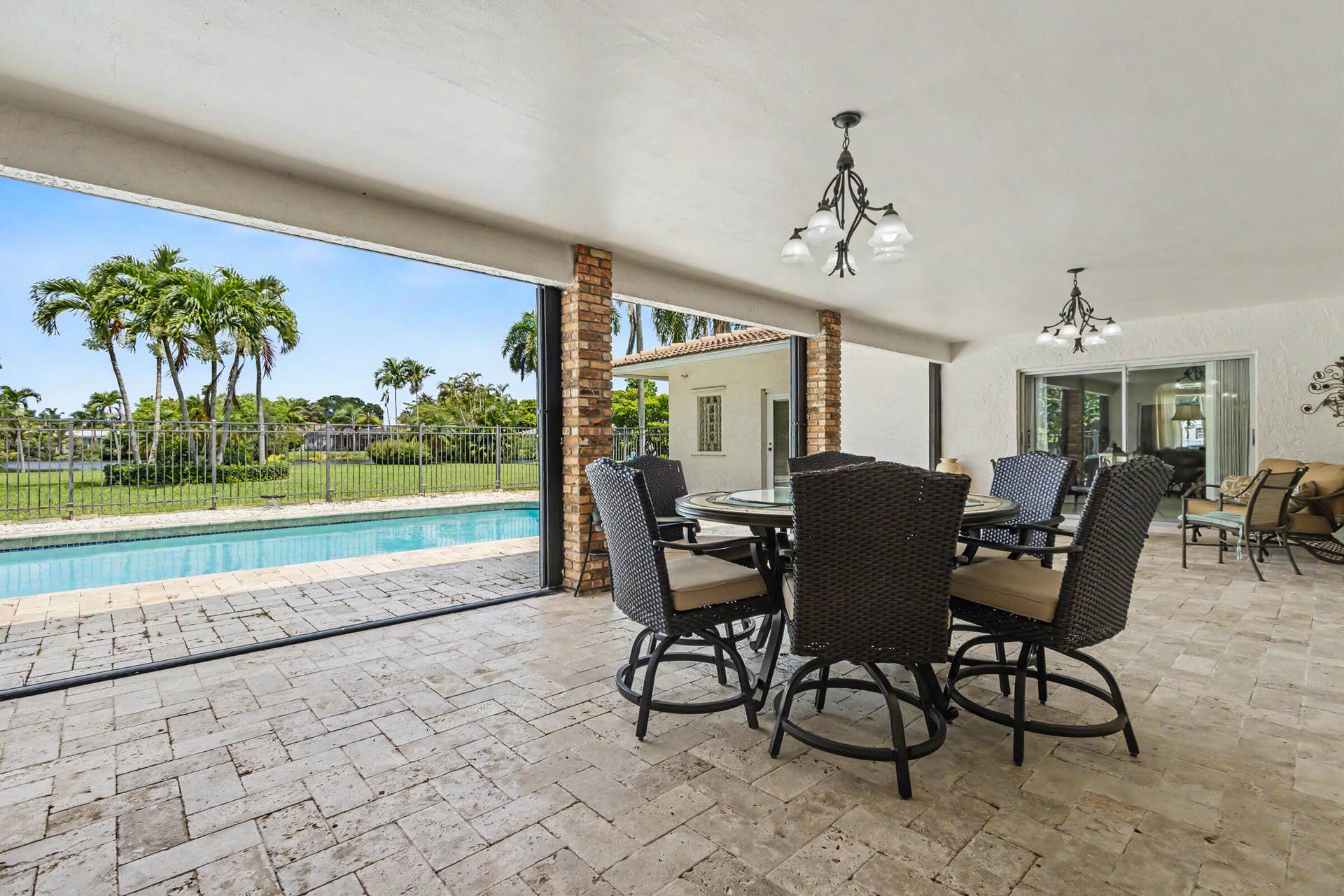 770 Ranch Road, Weston, FL 33326 spacious covered open patio complete with Accordion hurrican shutters
