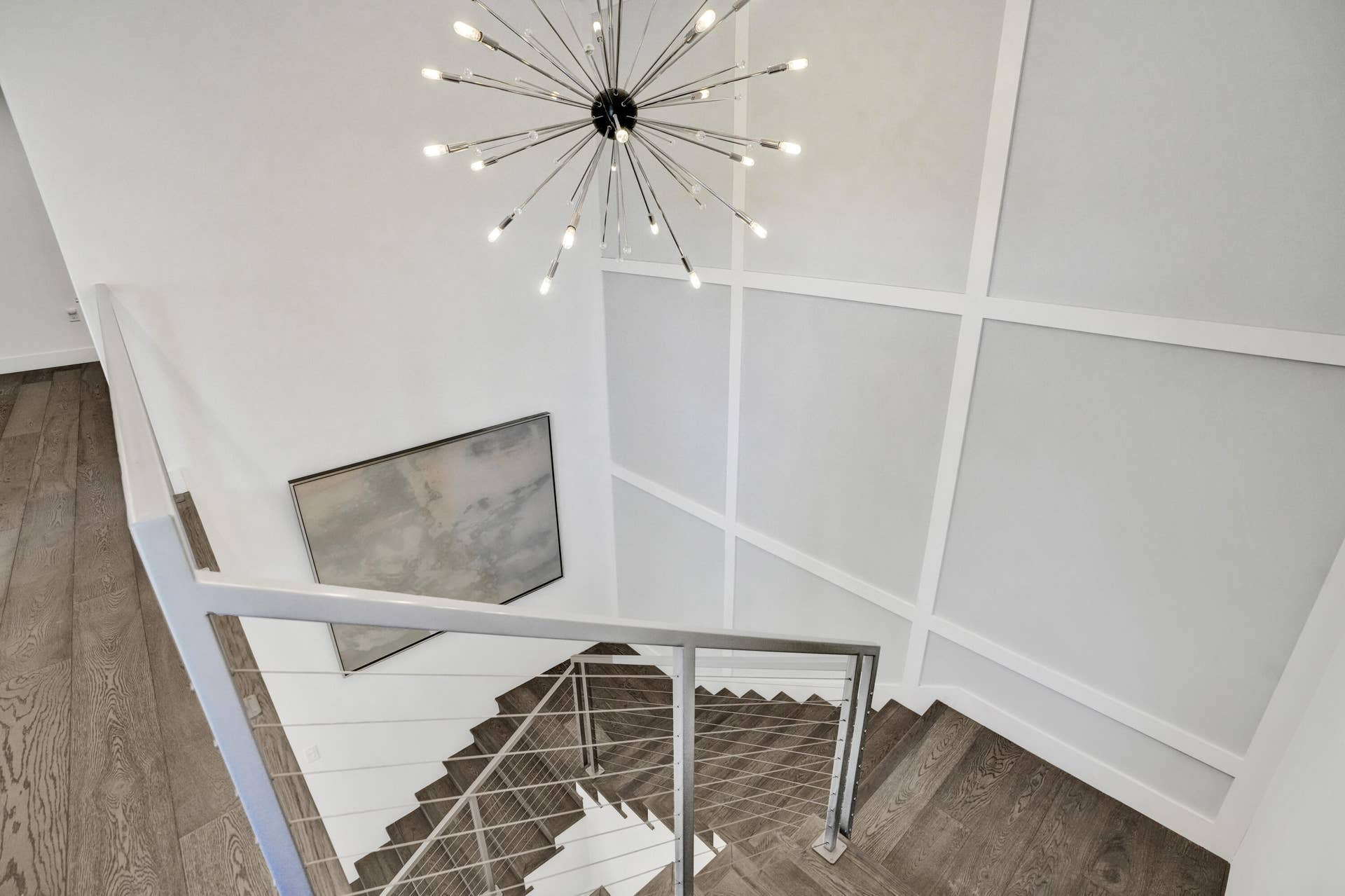 918 SE 8th Street, Fort Lauderdale, FL 33316 Beautiful lighting and custom woodwork in stairwell.
