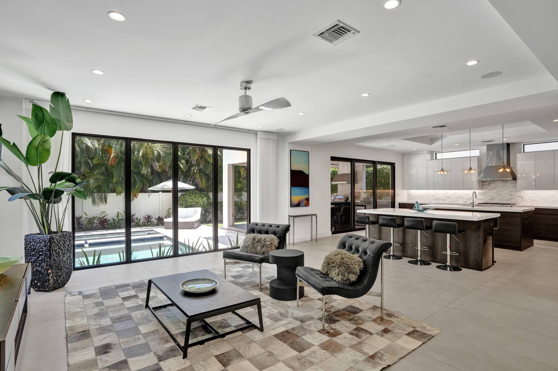 918 SE 8th Street, Fort Lauderdale, FL 33316 Open living room kitchen with pool views.