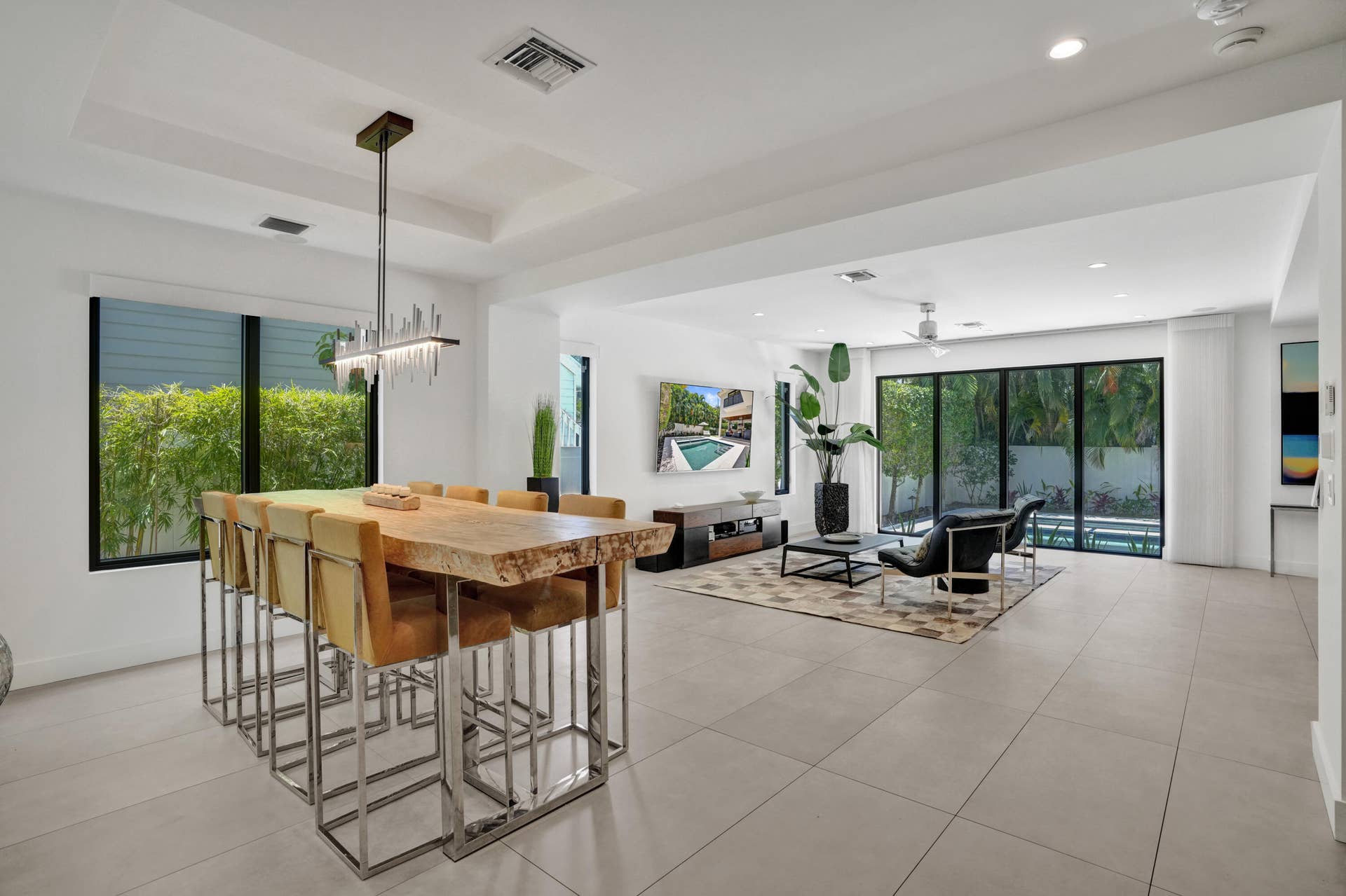 918 SE 8th Street, Fort Lauderdale, FL 33316 Dining area looking towards living area and pool views.