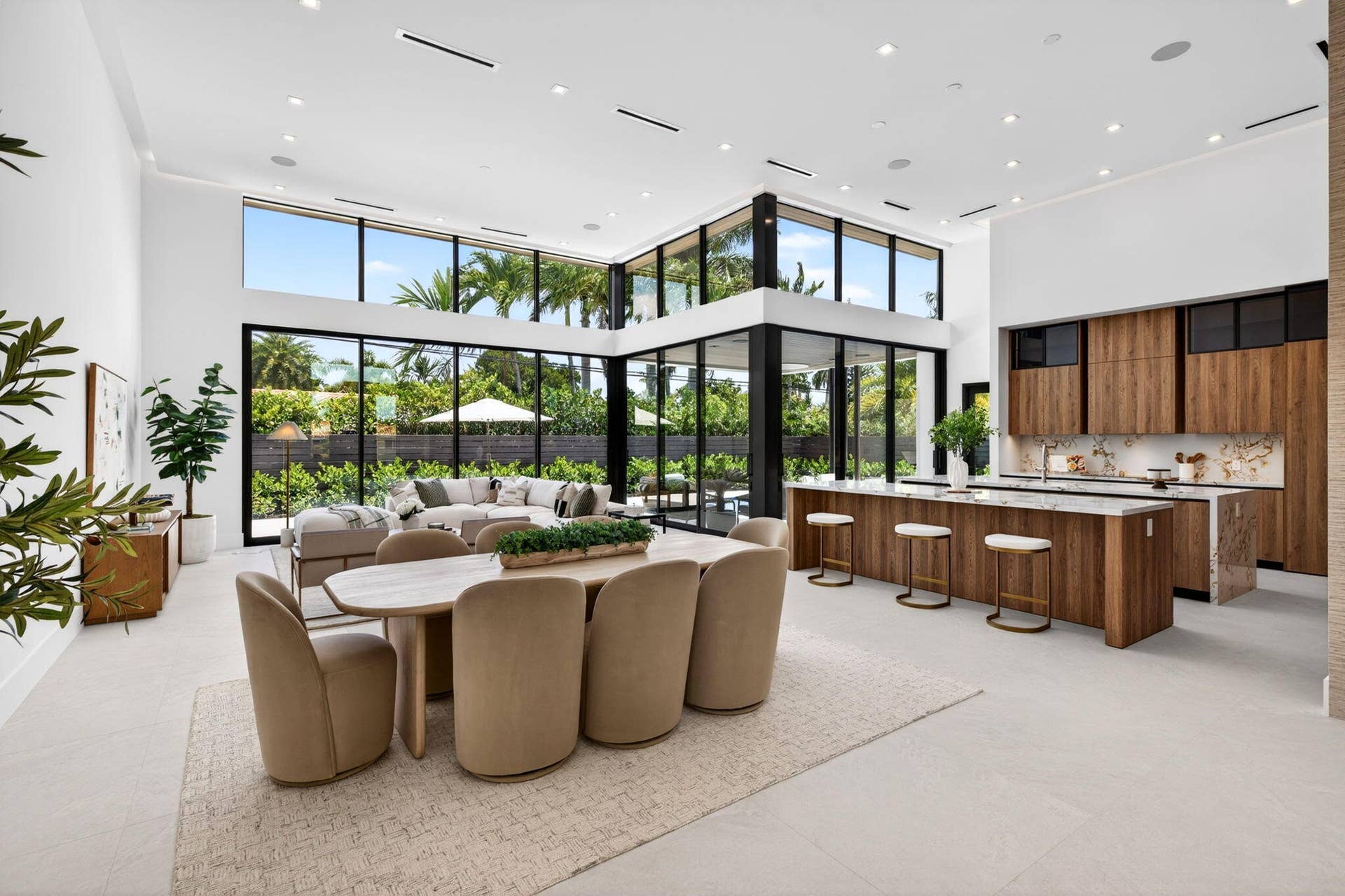 2717 NE 33rd Street, Fort Lauderdale, FL 33306 Light-filled interiors emphasize dramatic volume, clean modern finishes, and a seamless connection between living and entertaining spaces.